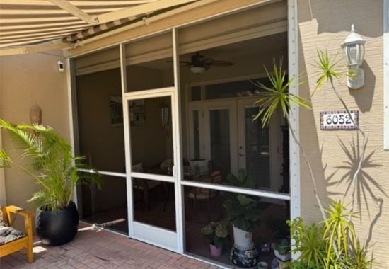 Cleaned and restored screened patio enclosure after professional service