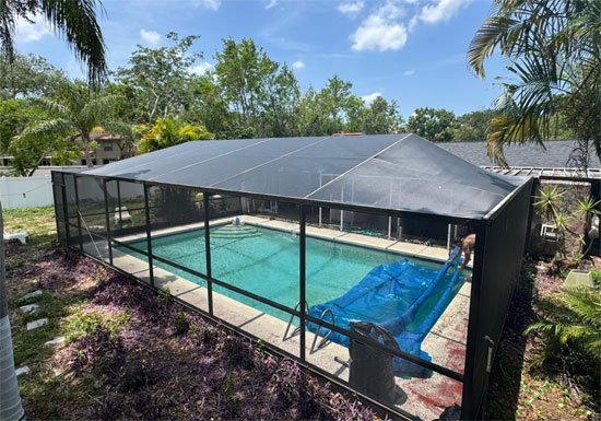 clean and restored pool enclosure after professional cleaning.