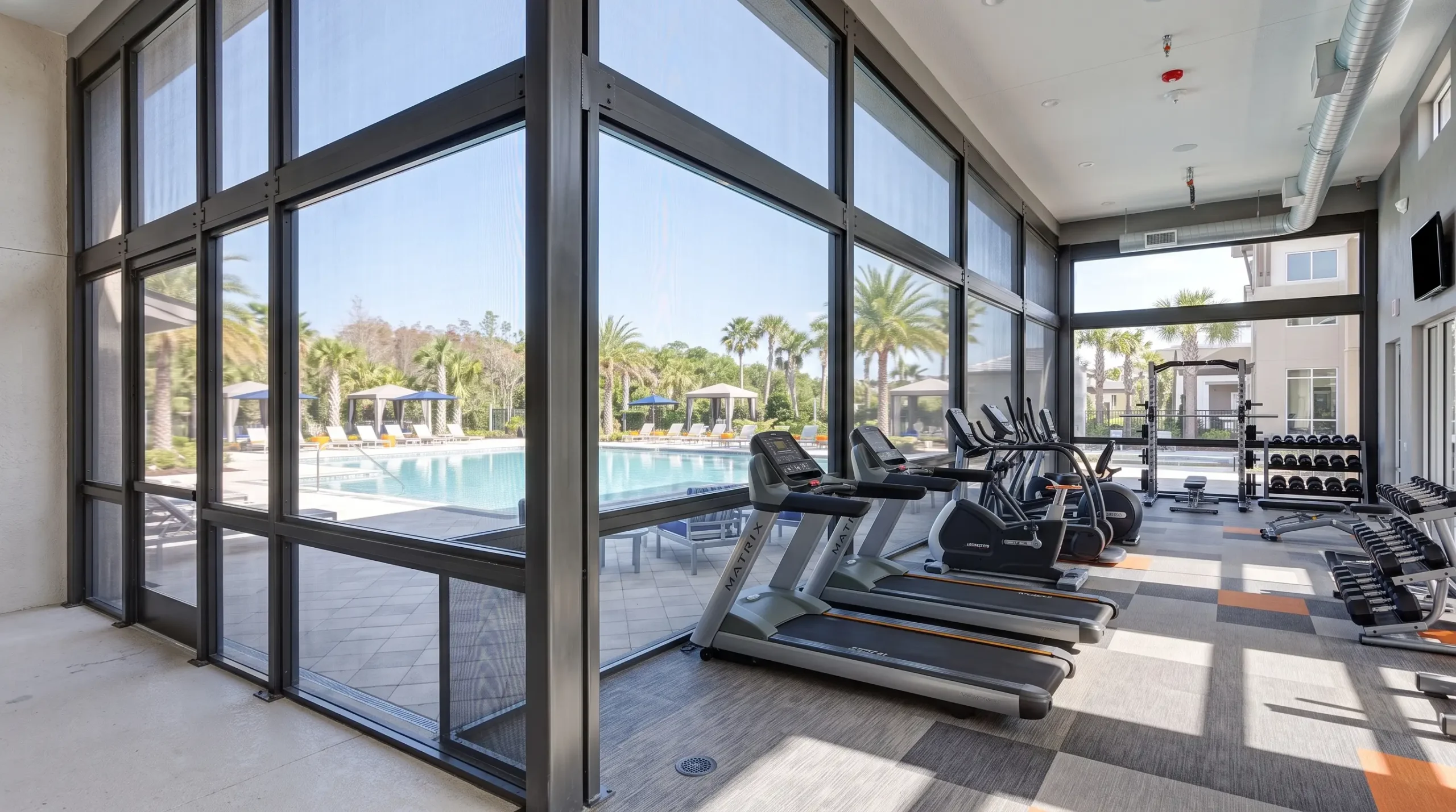 Commercial Screen Enclosure for Poolside Gymnasium in Florida